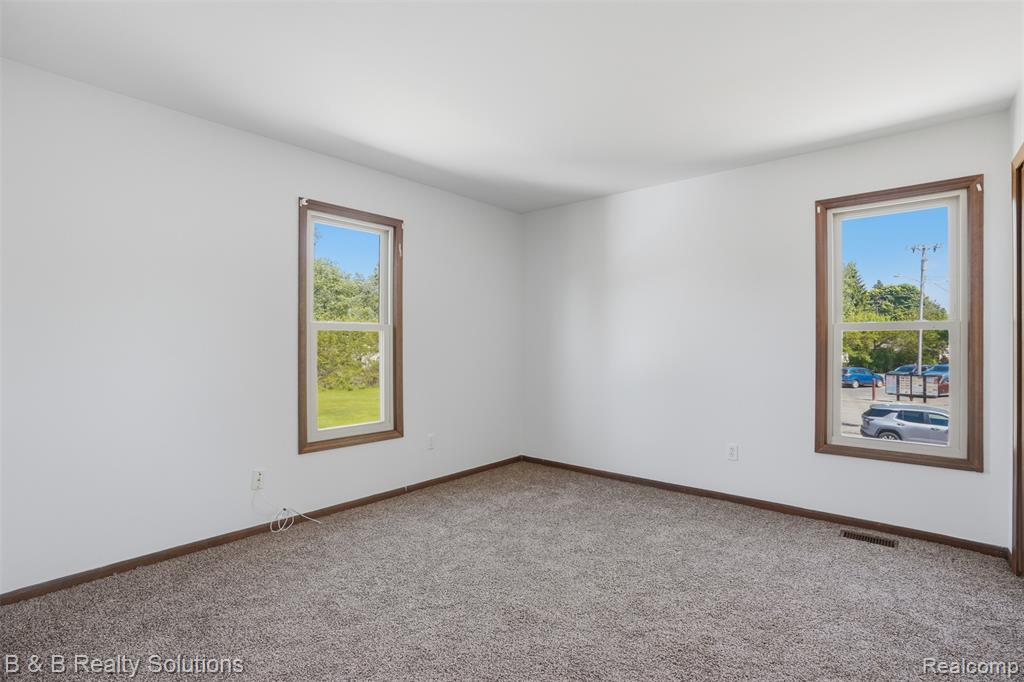 780 North Van Dyke Road, Unit APARTMENT #1 Almont, MI 48003 - Photo 24 of 28
