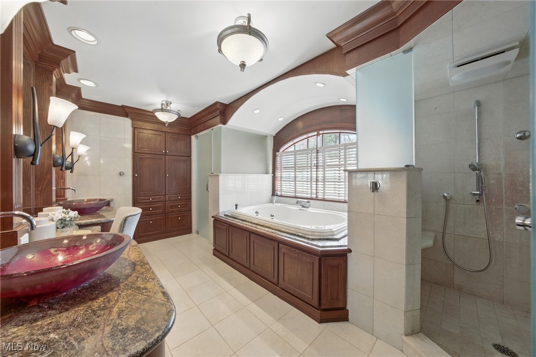 2679 Inverness Road Shaker Heights, OH 44122 - Photo 24 of 35 Master bath has tiled shower, double sinks, seating, jetted tub, closet.