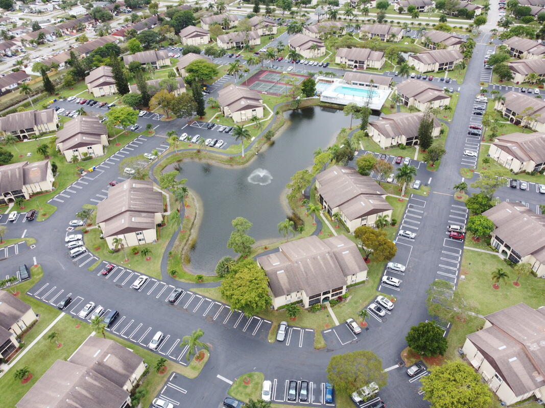 320 Pine Ridge Circle, Unit A1 Greenacres, FL 33463 - Photo 42 of 65 an aerial view of a city