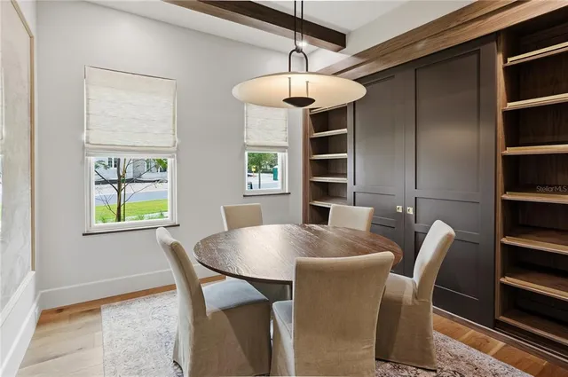 a kitchen with a sink cabinets and utility