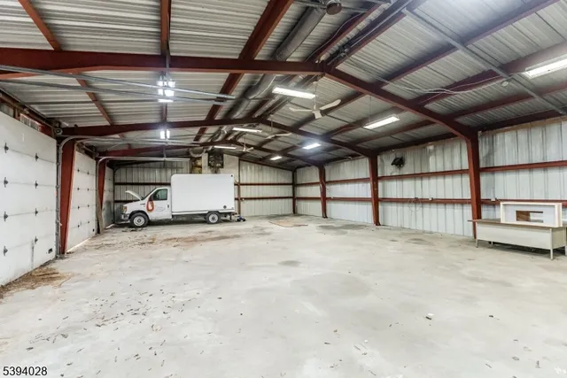 a wooden bench sitting in middle of a yard