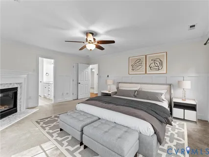 a view of an empty room with chandelier fan and fire place