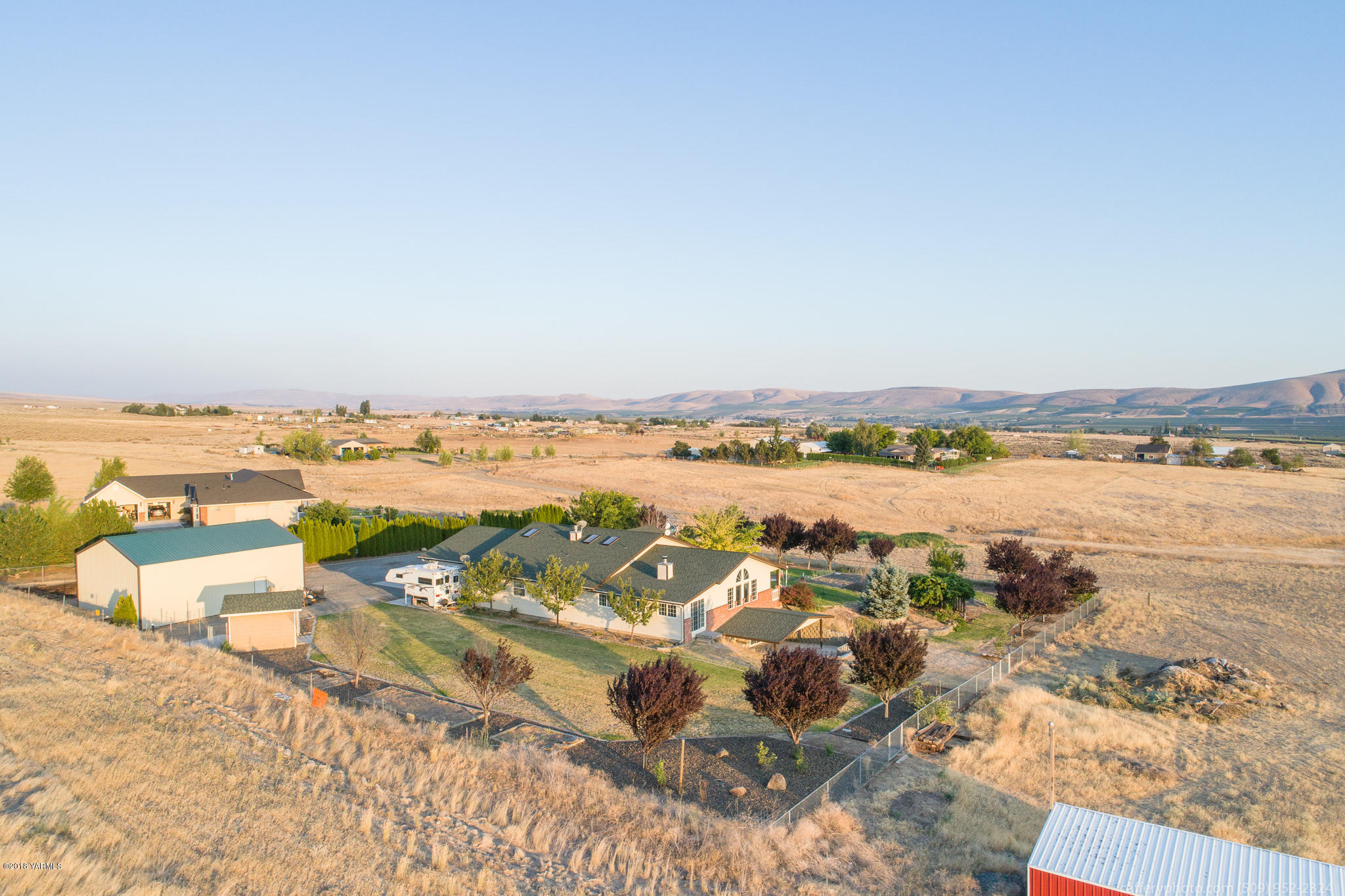 11517 Mieras Road Yakima, WA 98901 - Photo 3 of 57 an aerial view of ocean and residential houses with outdoor space