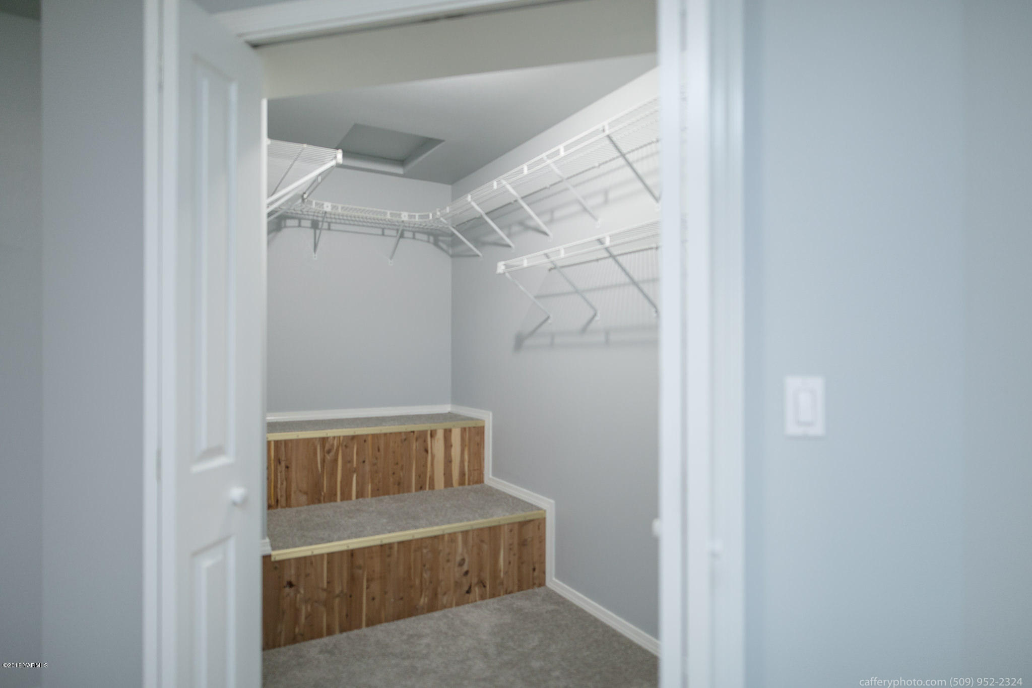 11517 Mieras Road Yakima, WA 98901 - Photo 41 of 57 a view of walk in closet with empty racks