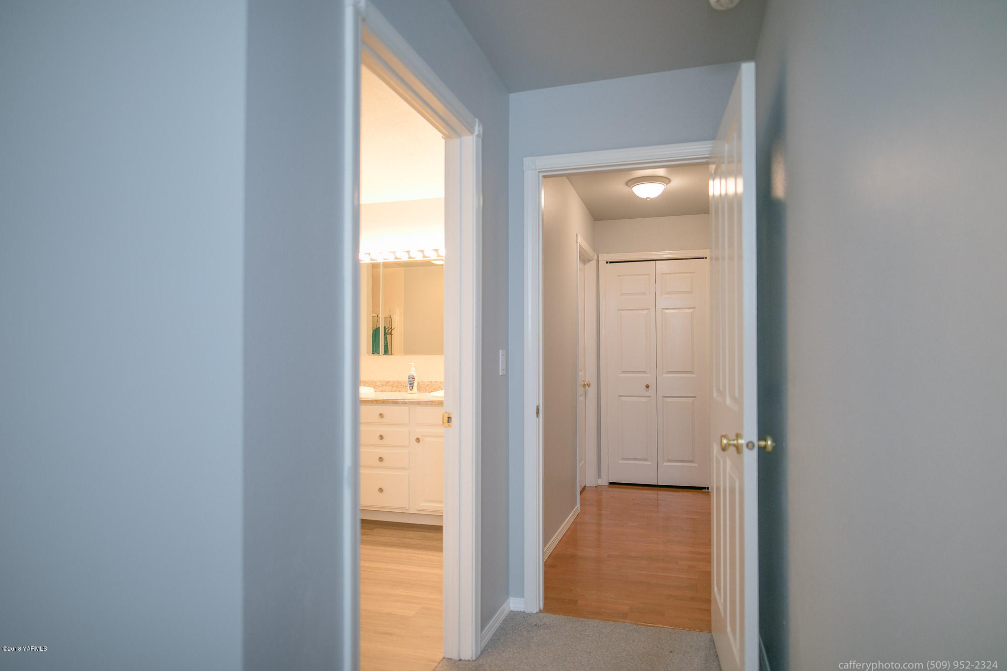 11517 Mieras Road Yakima, WA 98901 - Photo 43 of 57 a view of a bathroom from a corridor