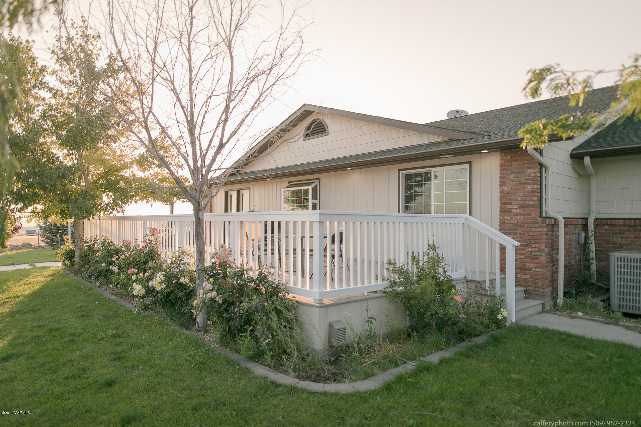 11517 Mieras Road Yakima, WA 98901 - Photo 55 of 57 a front view of a house with garden