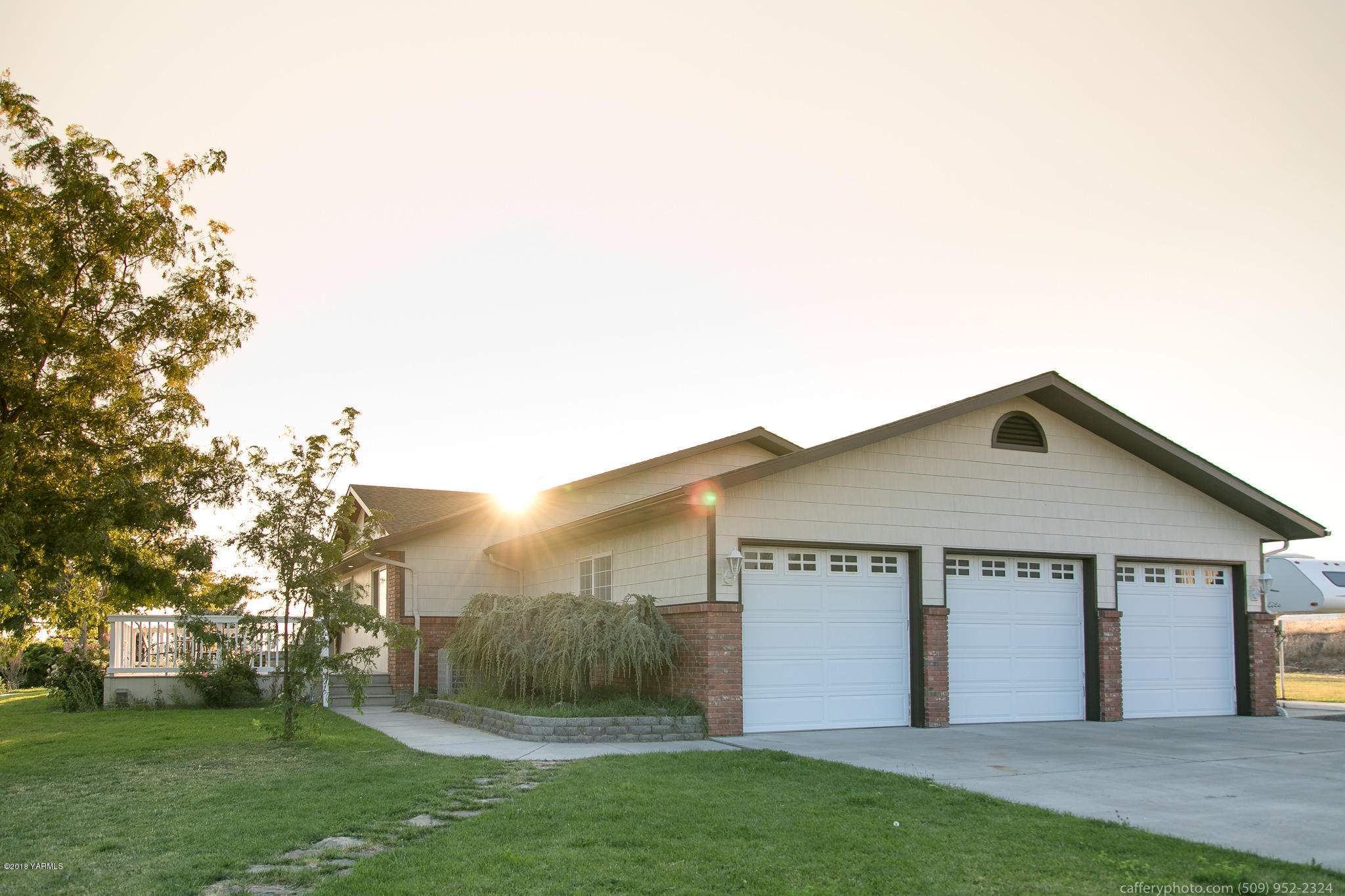 11517 Mieras Road Yakima, WA 98901 - Photo 56 of 57 a view of a house with a yard