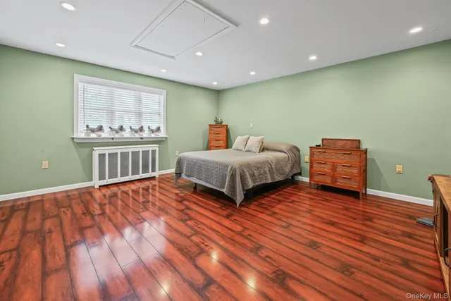 a room with furniture and a wooden floor