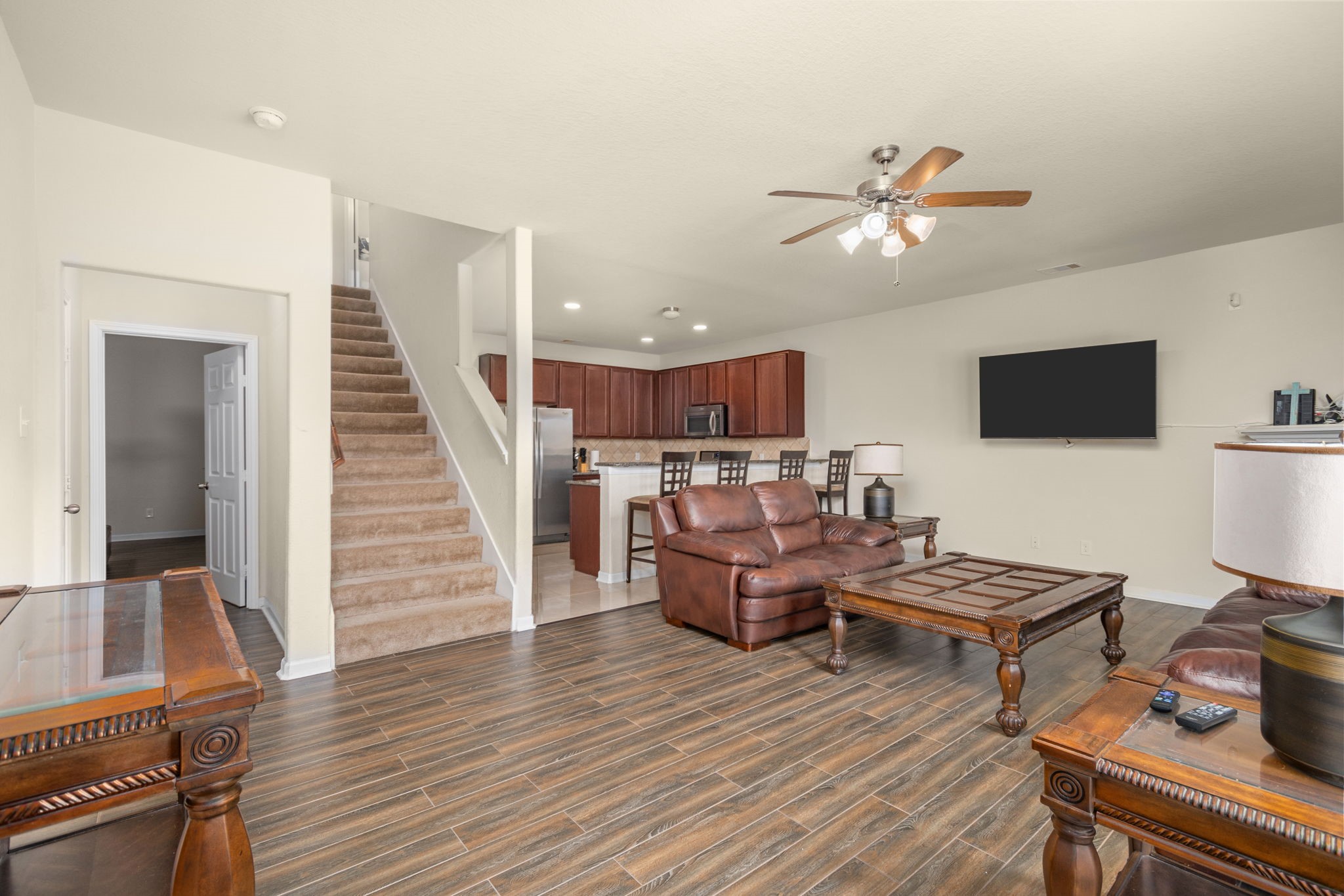 2702 Elm Crossing Trail Spring, TX 77386 - Photo 4 of 21 a living room with furniture and a flat screen tv