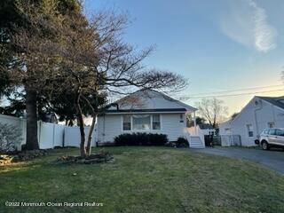 2001 Diana Road Wall, NJ 07719 - Photo 1 of 39 a front view of a house with a garden