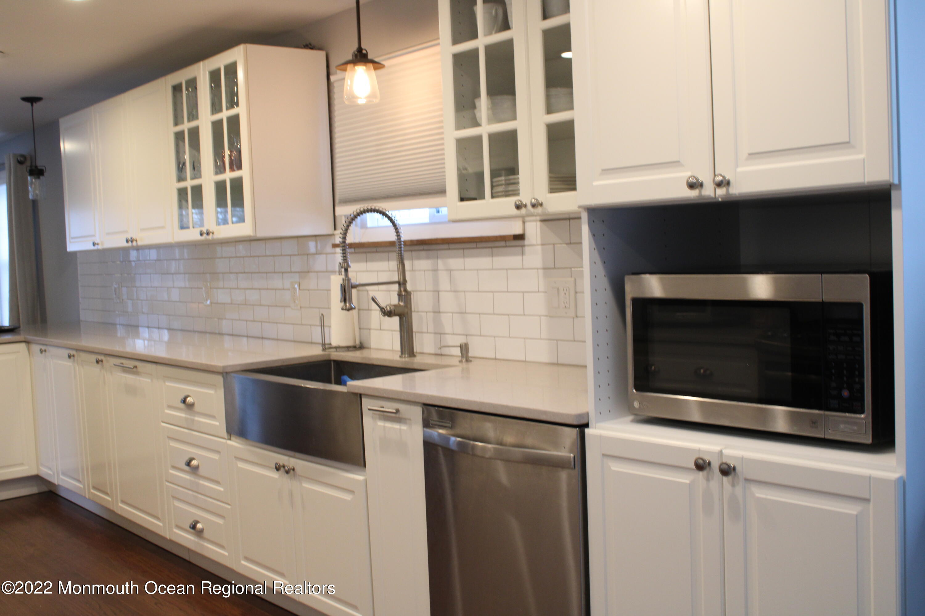 2001 Diana Road Wall, NJ 07719 - Photo 11 of 39 a kitchen with granite countertop white cabinets and appliances