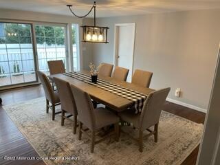 2001 Diana Road Wall, NJ 07719 - Photo 16 of 39 a view of a dining room with furniture and a chandelier