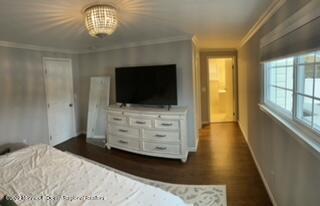 2001 Diana Road Wall, NJ 07719 - Photo 22 of 39 a view of bedroom with wooden floor and flat screen tv