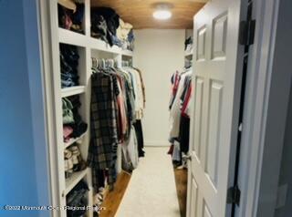 2001 Diana Road Wall, NJ 07719 - Photo 23 of 39 a view of walk in closet with clothes and shoes