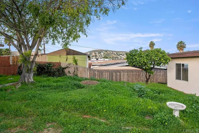 a house view with a garden space