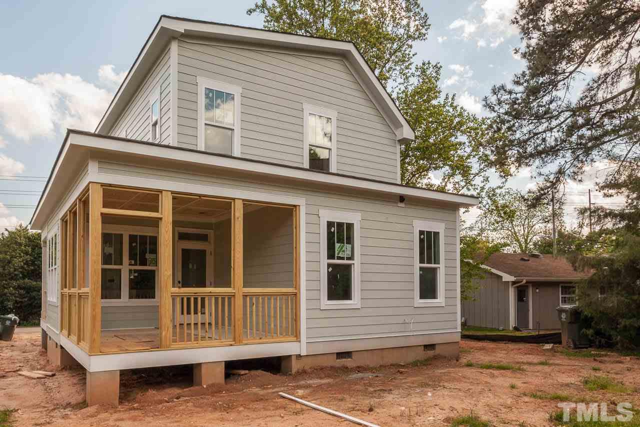 309 Georgetown Road Raleigh, NC 27608 - Photo 19 of 19 a front view of a house with a yard
