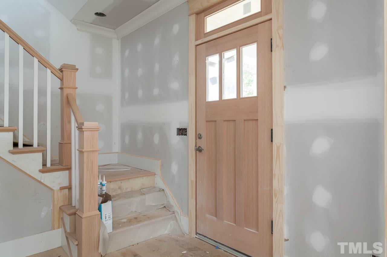 309 Georgetown Road Raleigh, NC 27608 - Photo 9 of 19 a bathroom with a glass door shower and a sink