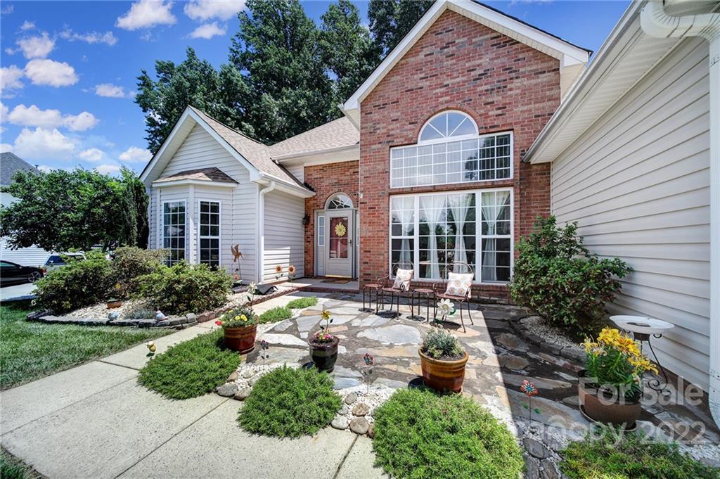549 South Portman Lane Fort Mill, SC 29708 - Photo 3 of 39 a front view of a house with garden