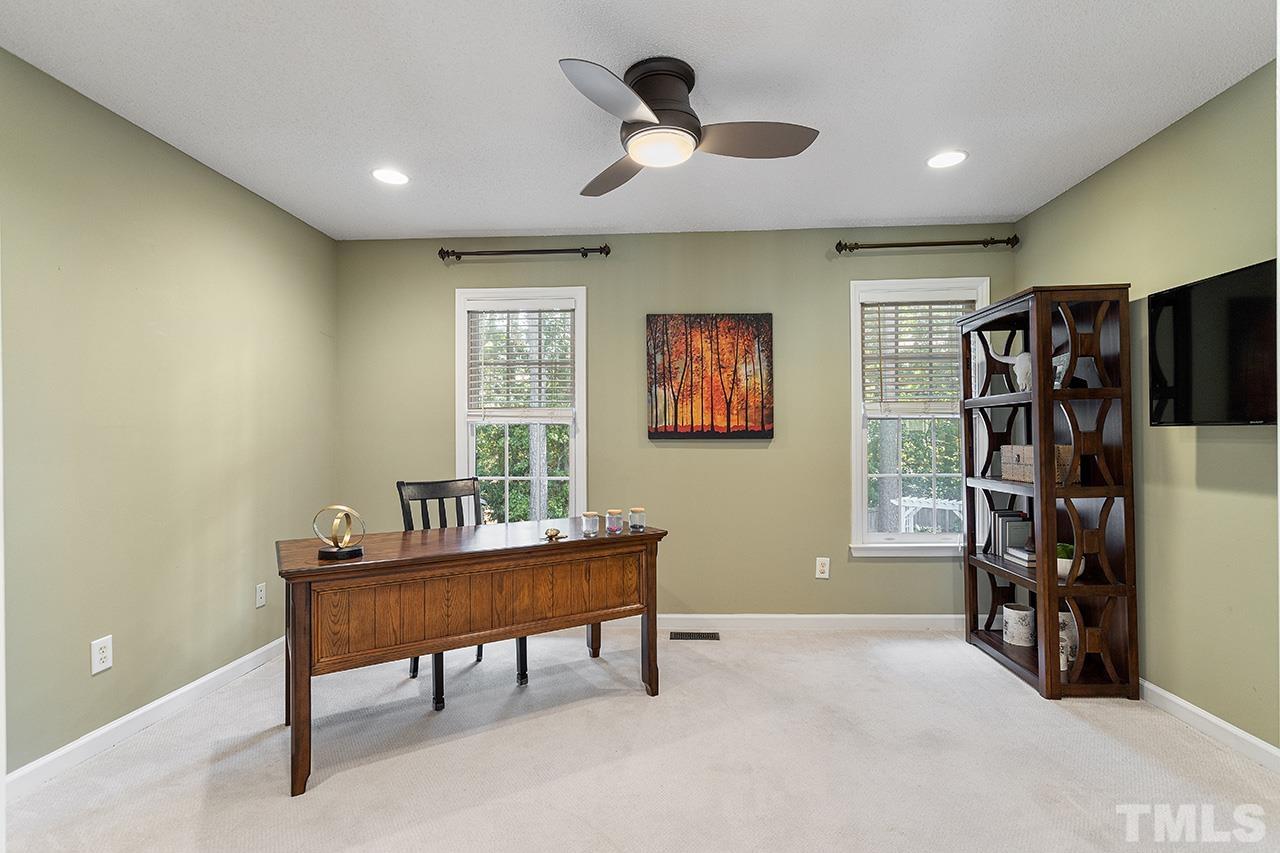 6103 Chesden Drive Durham, NC 27713 - Photo 16 of 22 a workspace with furniture and window