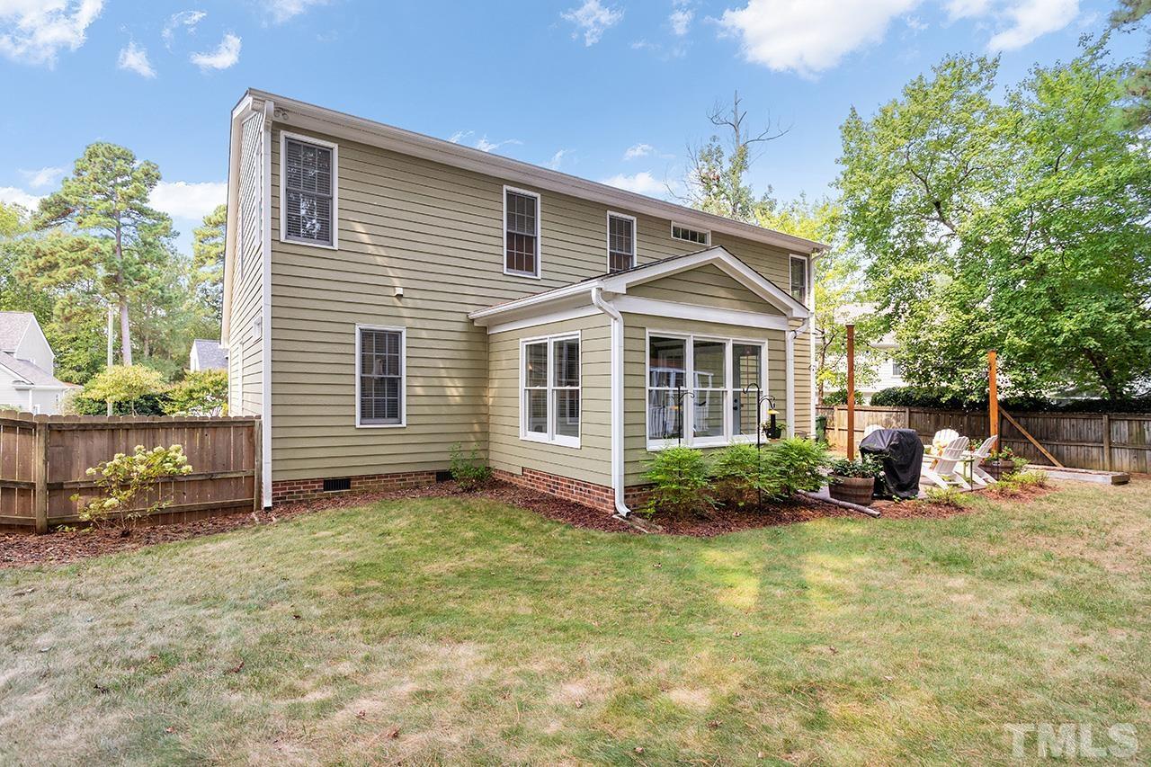 6103 Chesden Drive Durham, NC 27713 - Photo 20 of 22 a front view of a house with a yard