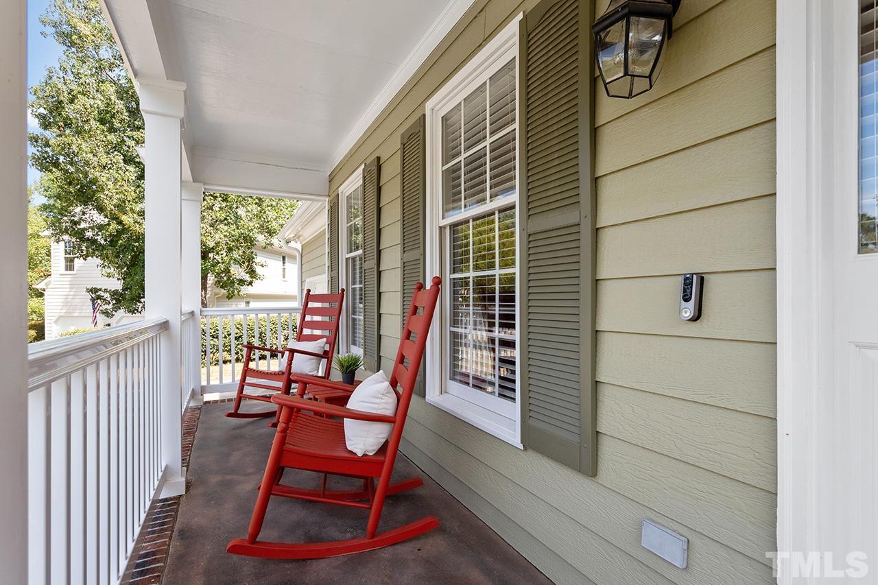6103 Chesden Drive Durham, NC 27713 - Photo 2 of 22 a view of a balcony with chairs