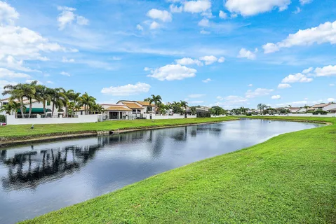 a view of houses with yard and outdoor space