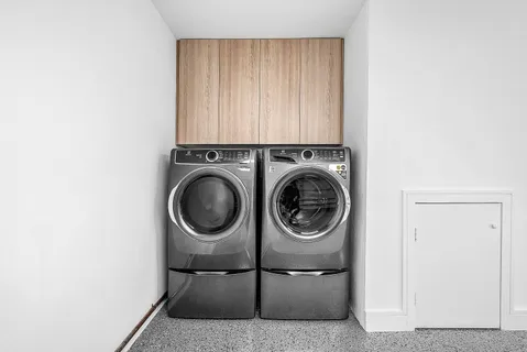 a view of multiple houses with yard