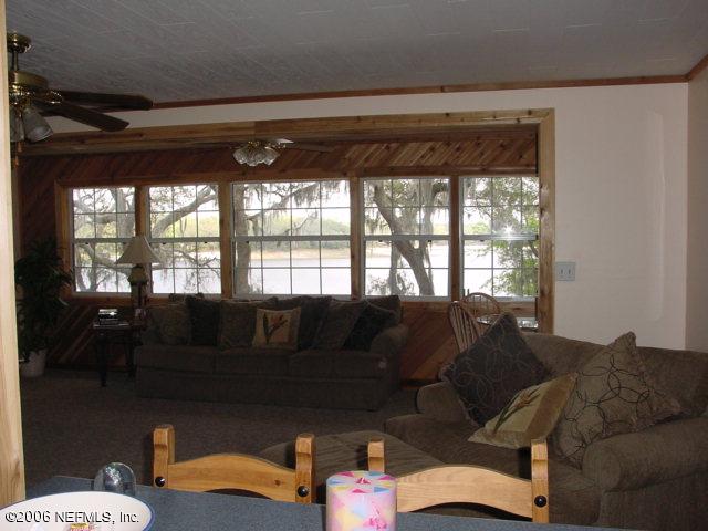 6686 Brooklyn Bay Road Keystone Heights, FL 32656 - Photo 17 of 22 View From Kitchen Thru G/Room to Lake