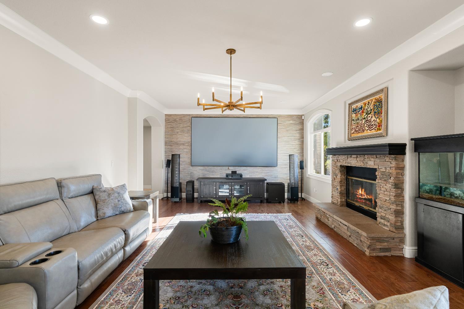 1580 Vista Ridge Way Roseville, CA 95661 - Photo 17 of 58 a living room with furniture a large window and a fireplace