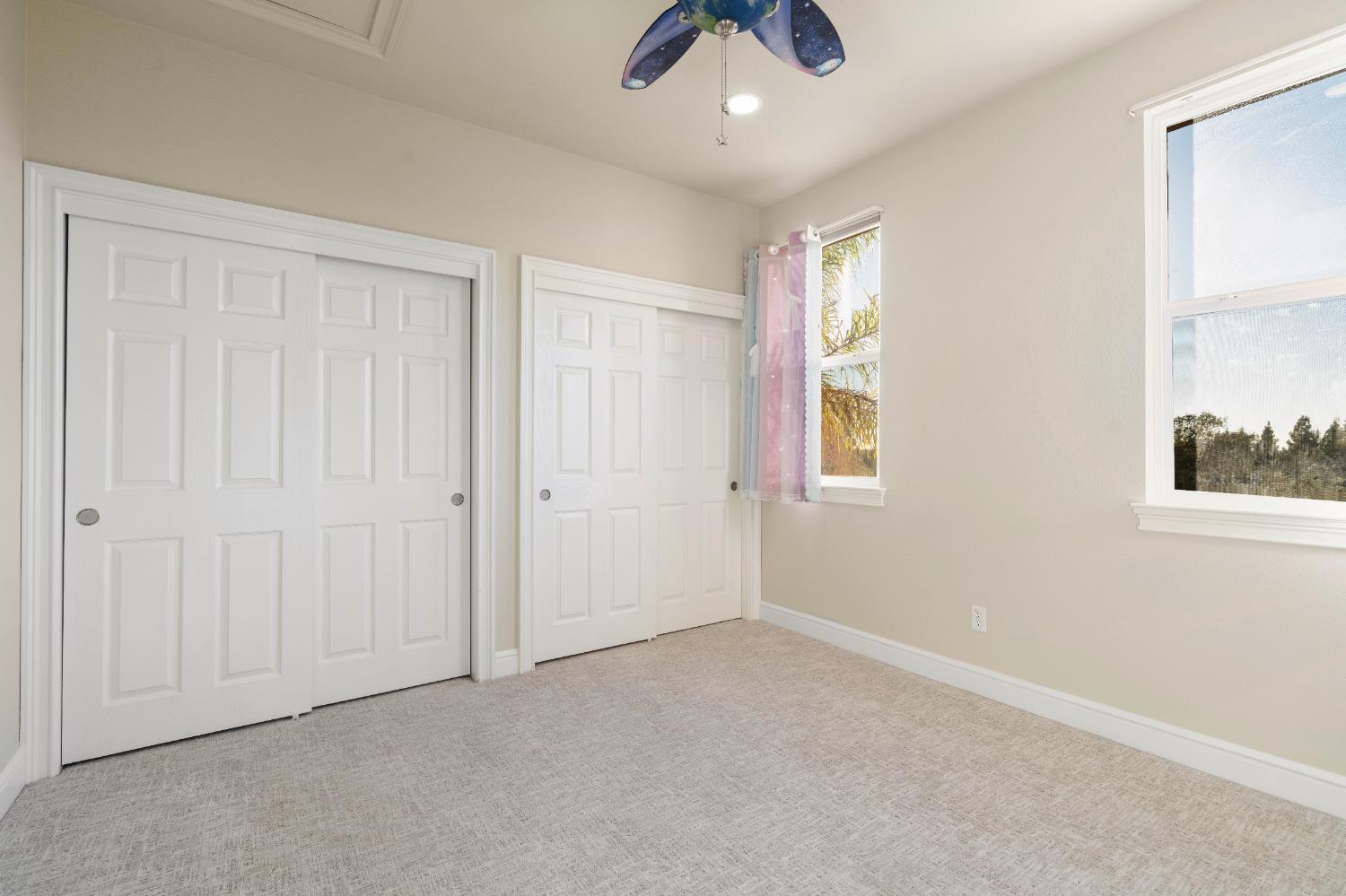 1580 Vista Ridge Way Roseville, CA 95661 - Photo 27 of 58 an empty room with chandelier fan