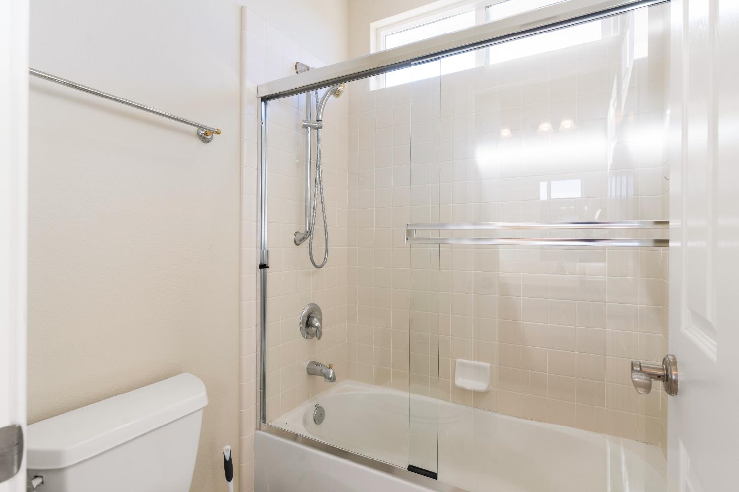 1580 Vista Ridge Way Roseville, CA 95661 - Photo 29 of 58 a bathroom with a shower and a toilet