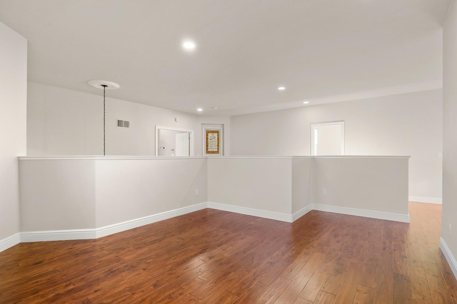 1580 Vista Ridge Way Roseville, CA 95661 - Photo 36 of 58 a view of empty room with wooden floor