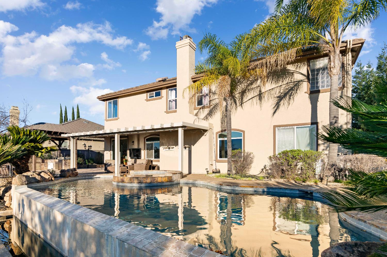 1580 Vista Ridge Way Roseville, CA 95661 - Photo 48 of 58 a front view of a house with swimming pool