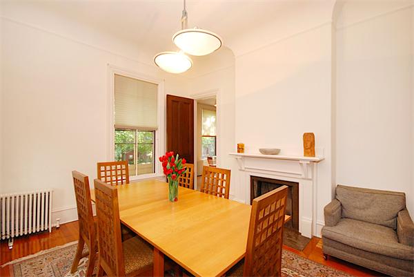 87 Perry Street Brookline, MA 02446 - Photo 3 of 12 a view of a livingroom with furniture and a fireplace