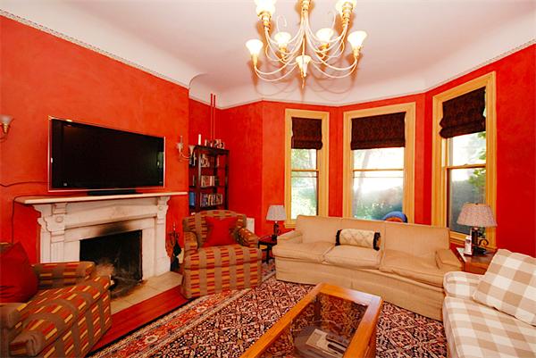 87 Perry Street Brookline, MA 02446 - Photo 5 of 12 a living room with furniture fireplace and flat screen tv