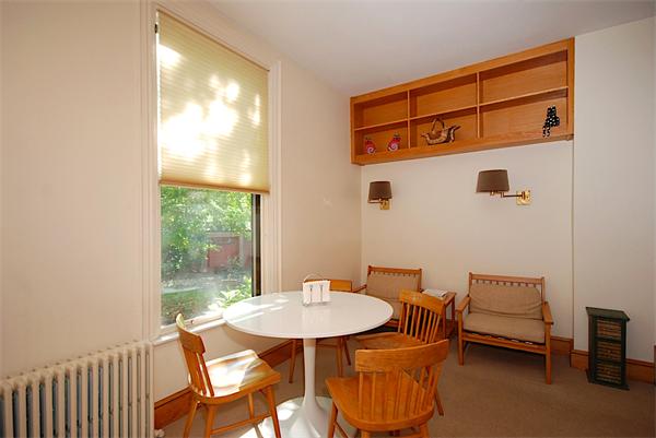 87 Perry Street Brookline, MA 02446 - Photo 6 of 12 a view of a dining room with furniture and window