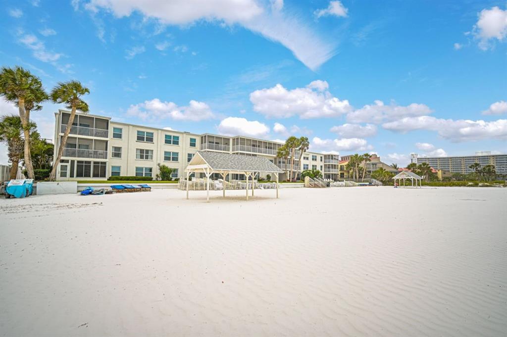 6154 Midnight Pass Road, Unit A18 Sarasota, FL 34242 - Photo 4 of 9 a city view with tall buildings and a street view