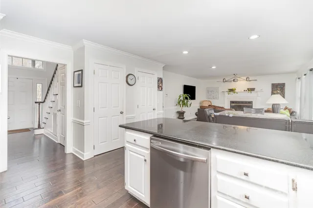 a kitchen with counter top space sink and refrigerator