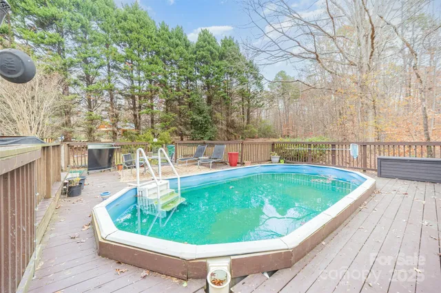 a view of a swimming pool with a patio