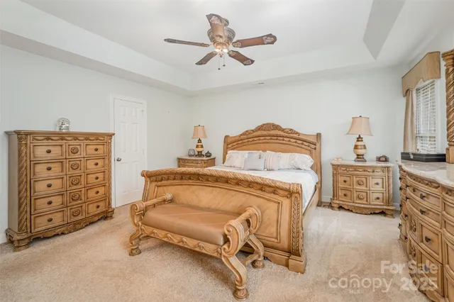 a bedroom with a bed and a cabinets