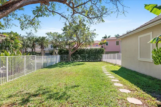 a bed room with a bed mirror and window