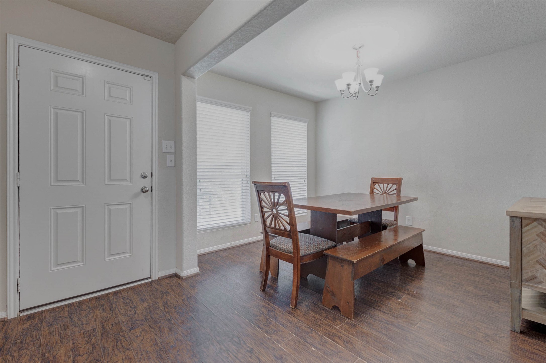 3027 Upland Spring Trace Katy, TX 77493 - Photo 5 of 29 a dining room with furniture and wooden floor