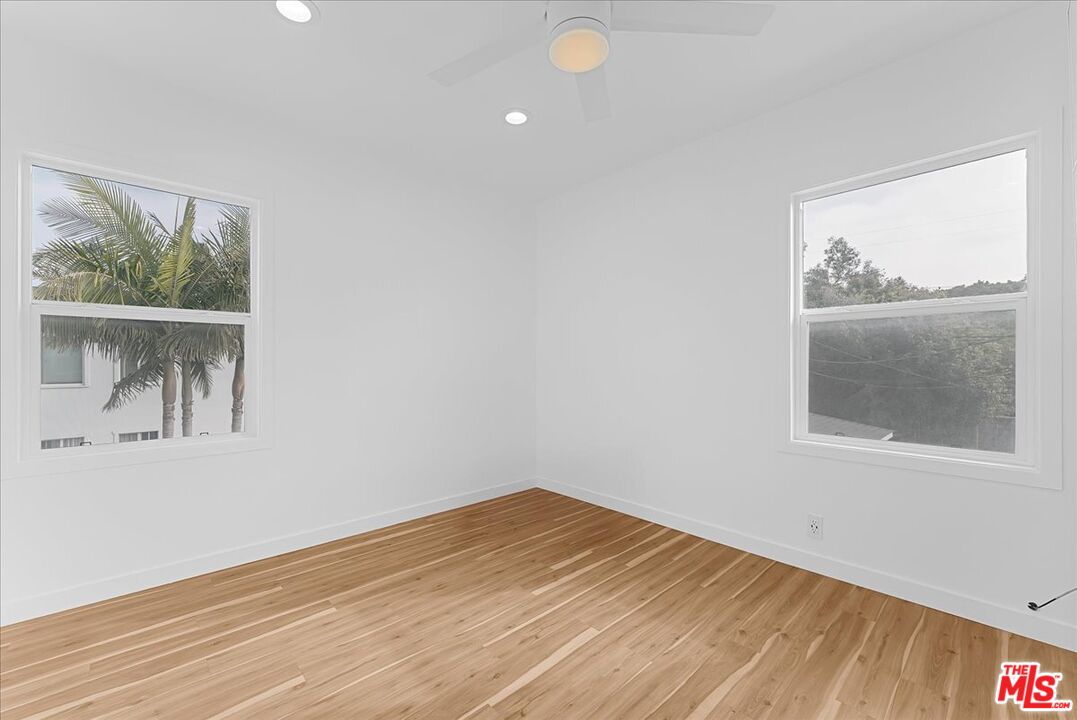 2948 Exposition Boulevard, Unit 7 Santa Monica, CA 90404 - Photo 12 of 15 an empty room with a window
