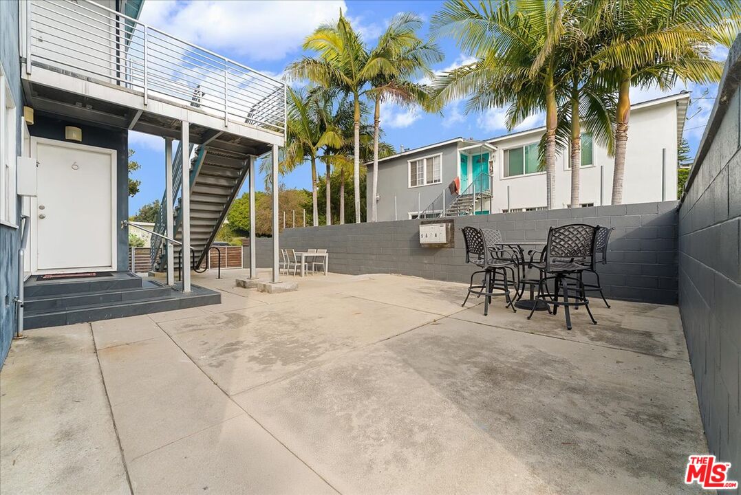 2948 Exposition Boulevard, Unit 7 Santa Monica, CA 90404 - Photo 14 of 15 a view of a dinning tables and chairs in patio