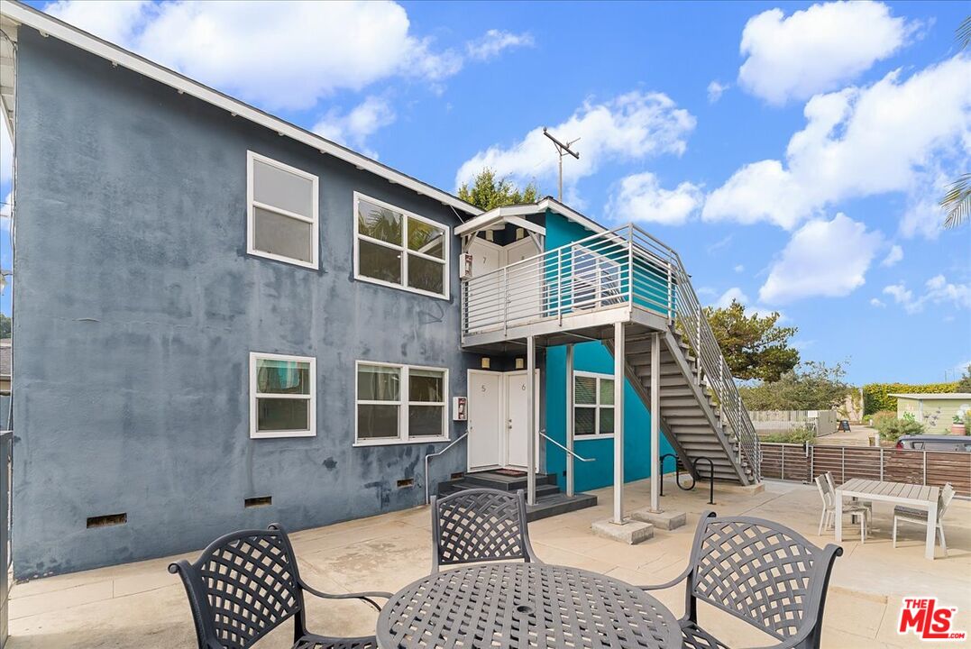 2948 Exposition Boulevard, Unit 7 Santa Monica, CA 90404 - Photo 15 of 15 a front view of a house with outdoor seating