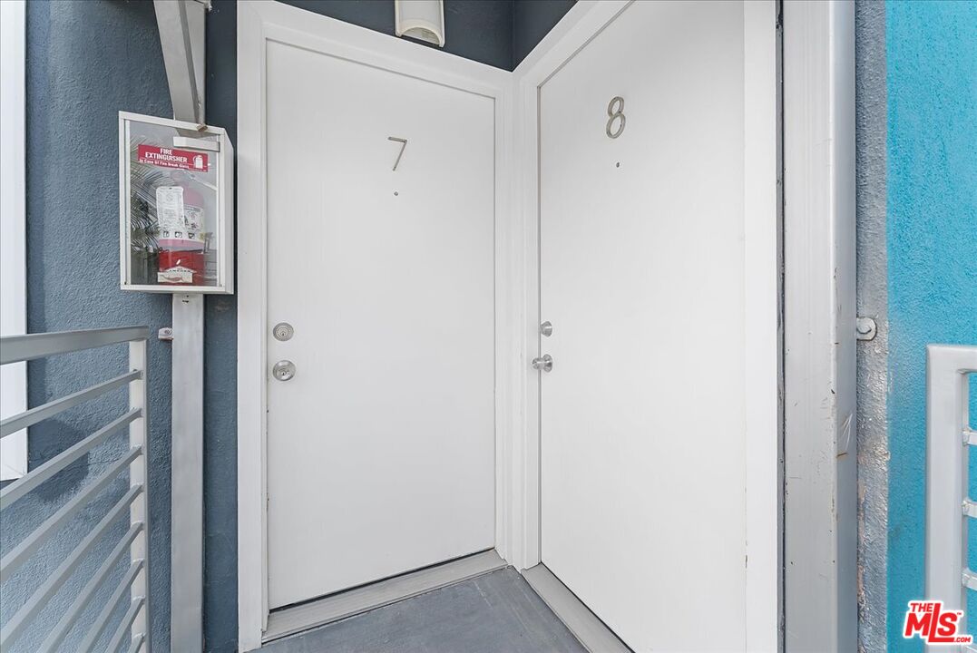 2948 Exposition Boulevard, Unit 7 Santa Monica, CA 90404 - Photo 4 of 15 a view of room with wooden floor