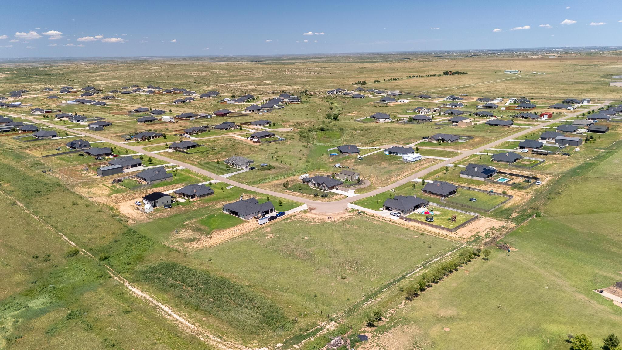 19851 Legacy Ranch Road Amarillo, TX 79124 - Photo 4 of 4 an aerial view of residential houses with outdoor space