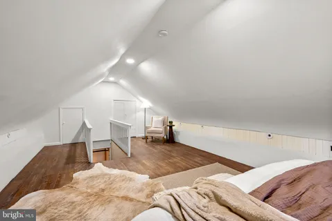 a bed room with a bed and a couch