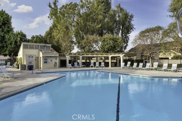 a view of a swimming pool with a patio