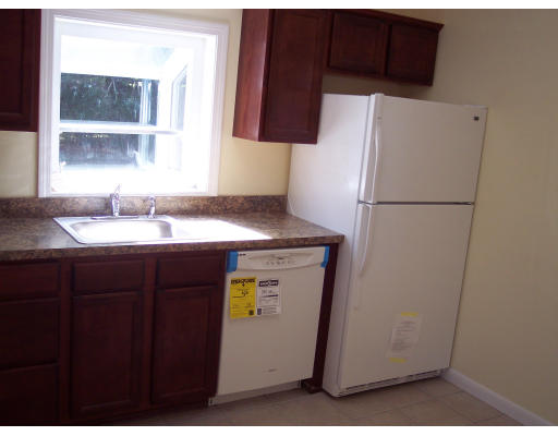 100 Slater Avenue Springfield, MA 01119 - Photo 12 of 12 a white refrigerator freezer sitting inside of a kitchen